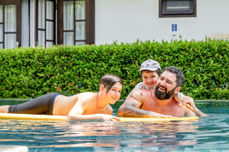 family enjoying in costa maya pools